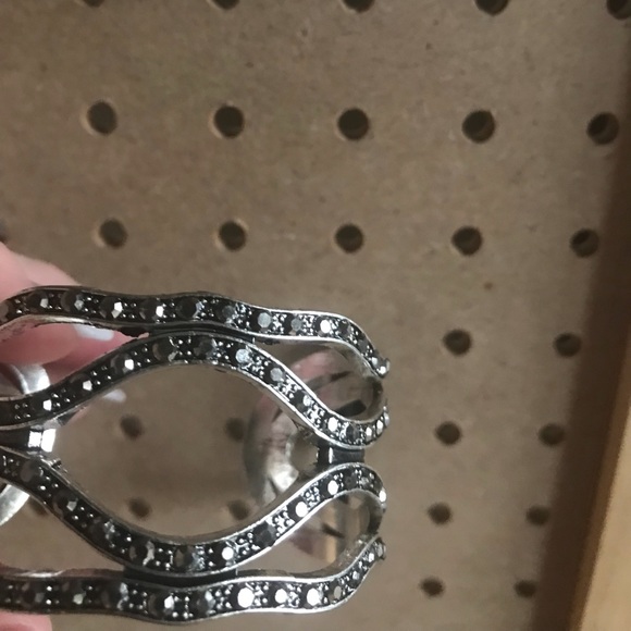 Silver cuff w/gunmetal stone accents.